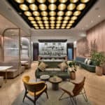 SOHO living room, showing the spirit of the park with lusting greenery and steel backdrop