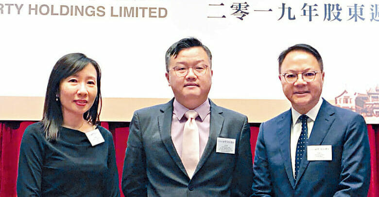 Jason Hui, chairman of Shimao Services Holdings and the son of Xu Rong Mao (middle)