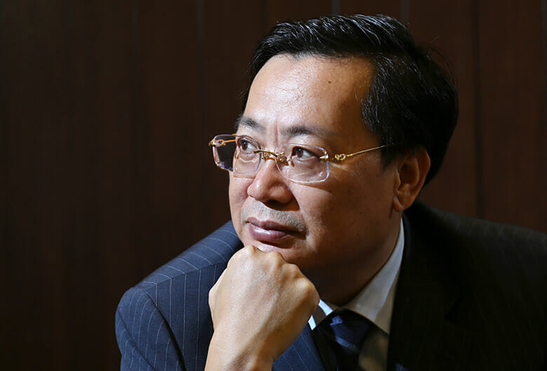 Lin Zhong, Chairman of CIFI Holdings (Group);  Portrait photograph taken in his office at One Pacific Place, Admiralty.