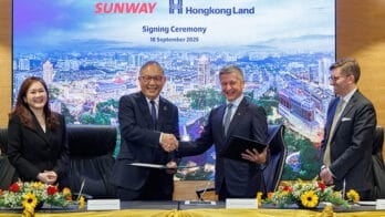 Sunway Group founder and chairman Jeffrey Cheah (2nd left) and Hongkong Land CEO Michael Smith (2nd right) seem please with the deal (Image: Hongkong Land)